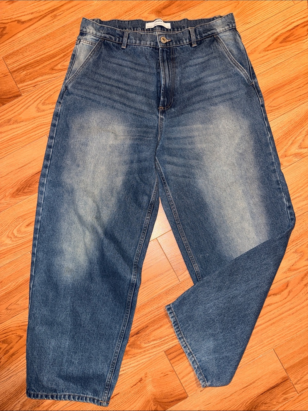 High-Rise Flare Jeans in Washed Blue — Women
